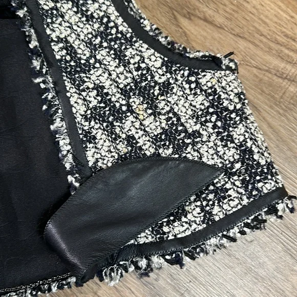 Chanel tweed + leather vest